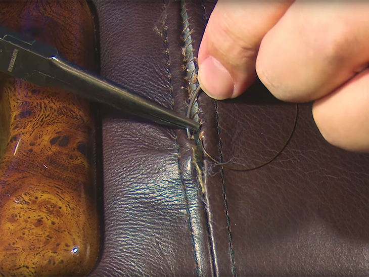 Use a ladder stitch to repair a broken seam on your upholstered furniture
